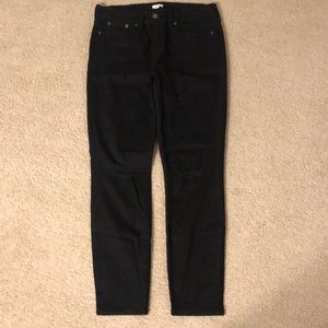 J. Crew distressed black jeans.